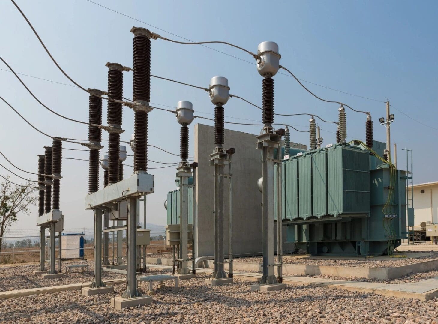 A group of electrical power lines and poles.