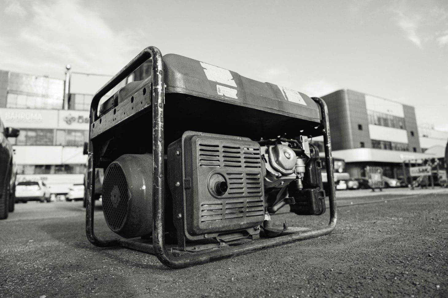 A black and white photo of an old generator.