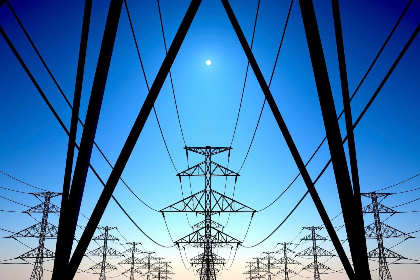 A group of power lines with one person standing on the other.