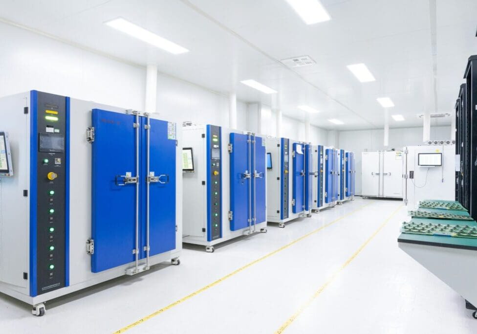 A row of blue doors in a room.
